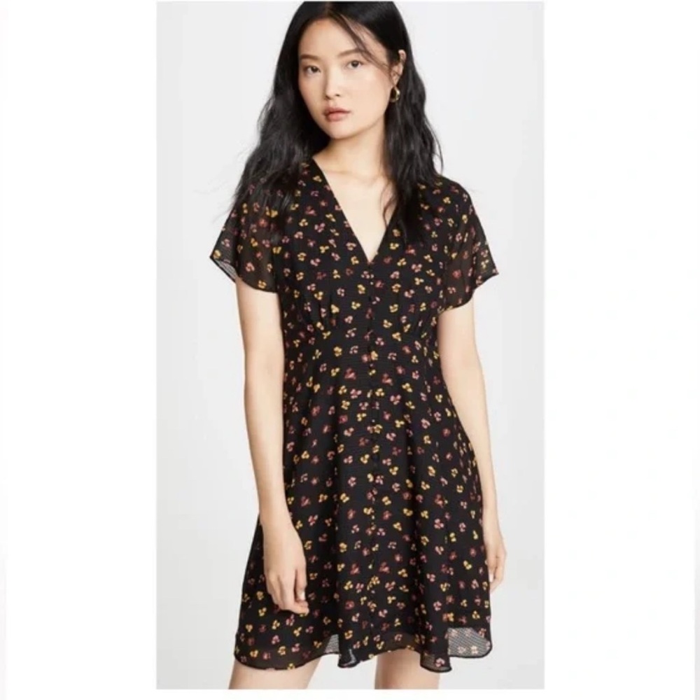 This is a Madewell Silk Button-Front Swing Dress in Feline Floral.